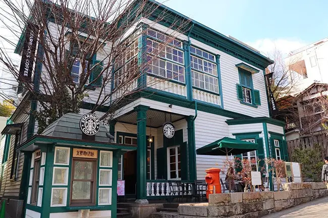 Kitano Ijinkan Starbucks exterior retro western building white green