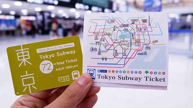 Inserting Tokyo Subway Ticket into the automatic gate machine