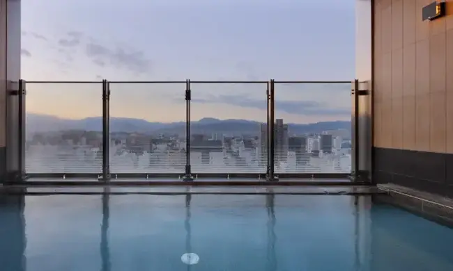 칸데오 호텔 마쓰야마 오카이도 침대